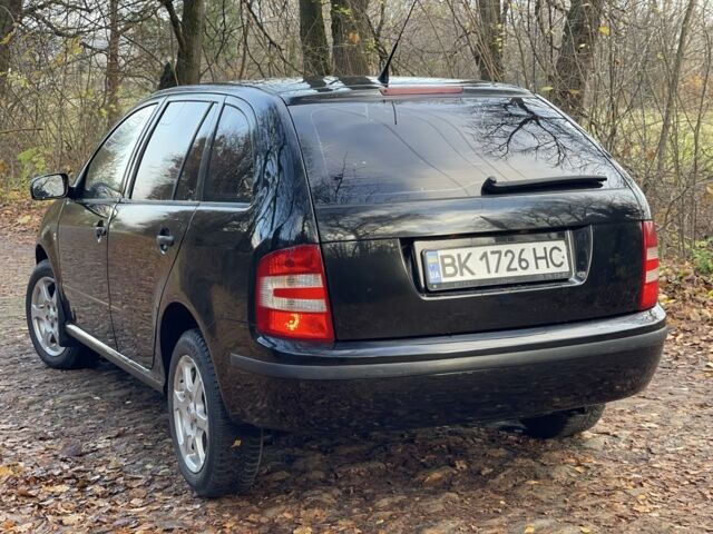 Черный Шкода Фабия, объемом двигателя 1.2 л и пробегом 380 тыс. км за 3100 $, фото 5 на Automoto.ua