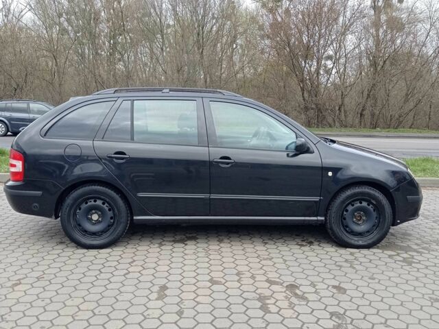 Чорний Шкода Фабія, об'ємом двигуна 2 л та пробігом 386 тис. км за 4994 $, фото 2 на Automoto.ua