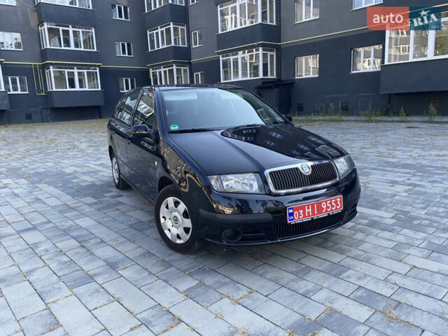 Черный Шкода Фабия, объемом двигателя 1.4 л и пробегом 201 тыс. км за 4750 $, фото 2 на Automoto.ua
