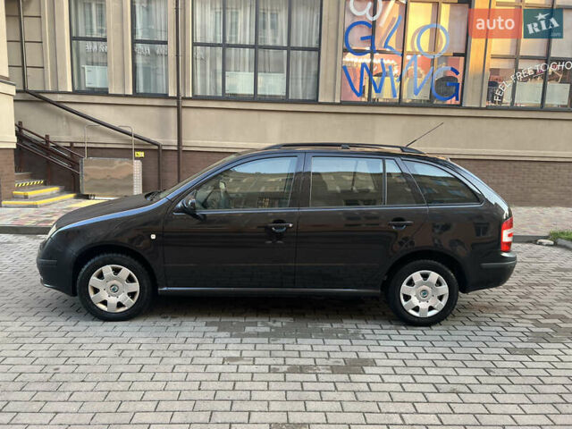 Черный Шкода Фабия, объемом двигателя 1.4 л и пробегом 270 тыс. км за 3950 $, фото 6 на Automoto.ua