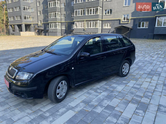 Черный Шкода Фабия, объемом двигателя 1.4 л и пробегом 201 тыс. км за 4750 $, фото 23 на Automoto.ua