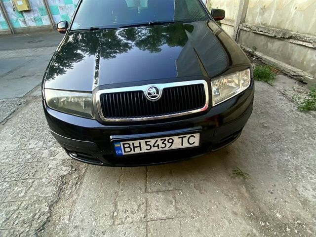 Черный Шкода Фабия, объемом двигателя 1.2 л и пробегом 265 тыс. км за 3500 $, фото 6 на Automoto.ua
