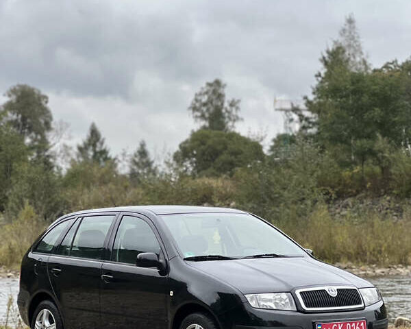 Черный Шкода Фабия, объемом двигателя 1.4 л и пробегом 220 тыс. км за 4450 $, фото 2 на Automoto.ua