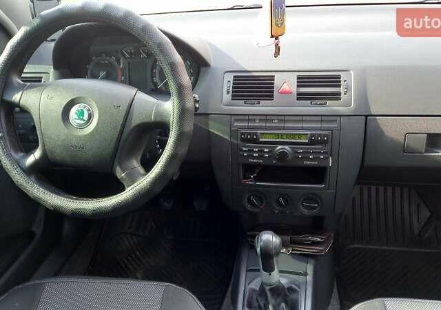 Черный Шкода Фабия, объемом двигателя 1.39 л и пробегом 252 тыс. км за 5000 $, фото 12 на Automoto.ua