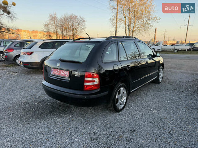 Черный Шкода Фабия, объемом двигателя 1.4 л и пробегом 200 тыс. км за 4999 $, фото 38 на Automoto.ua