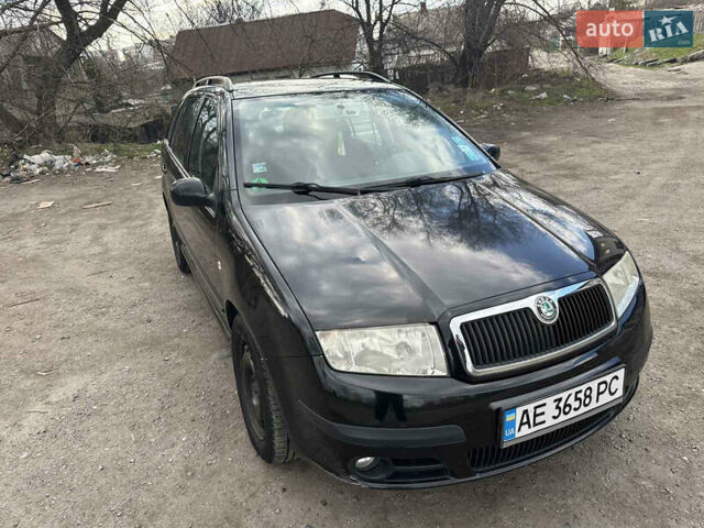 Черный Шкода Фабия, объемом двигателя 1.4 л и пробегом 150 тыс. км за 3700 $, фото 2 на Automoto.ua