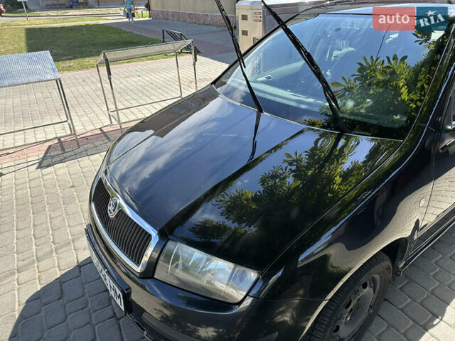 Черный Шкода Фабия, объемом двигателя 1.2 л и пробегом 170 тыс. км за 3700 $, фото 1 на Automoto.ua