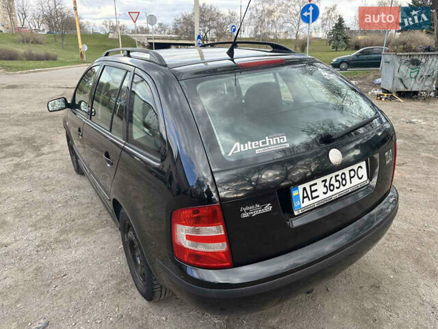 Черный Шкода Фабия, объемом двигателя 1.4 л и пробегом 150 тыс. км за 3700 $, фото 3 на Automoto.ua