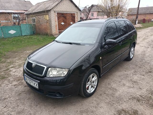 Черный Шкода Фабия, объемом двигателя 1.4 л и пробегом 232 тыс. км за 4999 $, фото 2 на Automoto.ua