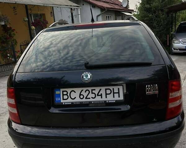 Черный Шкода Фабия, объемом двигателя 1.39 л и пробегом 220 тыс. км за 4650 $, фото 8 на Automoto.ua