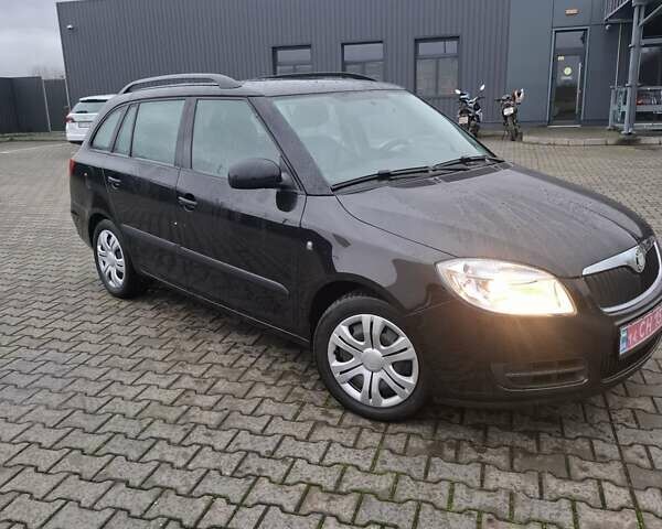 Черный Шкода Фабия, объемом двигателя 1.39 л и пробегом 227 тыс. км за 5499 $, фото 6 на Automoto.ua