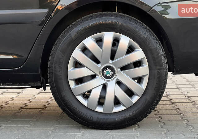 Черный Шкода Фабия, объемом двигателя 1.4 л и пробегом 195 тыс. км за 5850 $, фото 19 на Automoto.ua