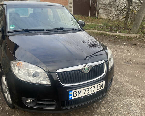 Черный Шкода Фабия, объемом двигателя 1.6 л и пробегом 172 тыс. км за 5950 $, фото 1 на Automoto.ua
