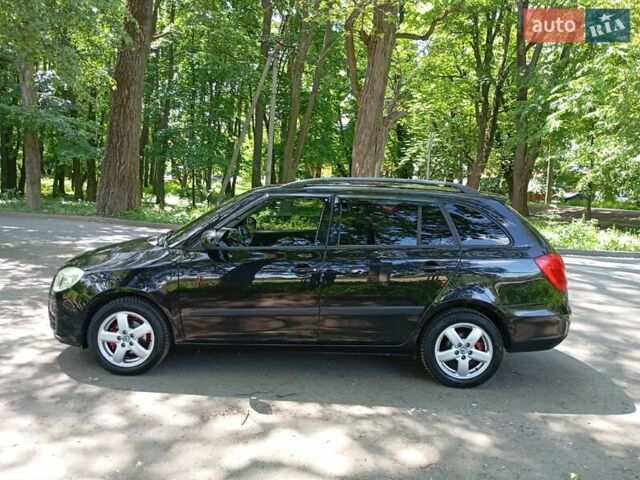 Черный Шкода Фабия, объемом двигателя 1.39 л и пробегом 229 тыс. км за 5350 $, фото 2 на Automoto.ua