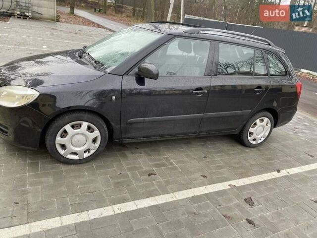 Черный Шкода Фабия, объемом двигателя 1.2 л и пробегом 174 тыс. км за 5193 $, фото 1 на Automoto.ua