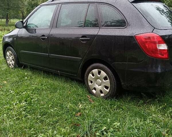 Черный Шкода Фабия, объемом двигателя 1.4 л и пробегом 234 тыс. км за 5050 $, фото 8 на Automoto.ua