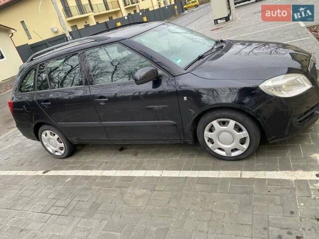 Черный Шкода Фабия, объемом двигателя 1.2 л и пробегом 174 тыс. км за 5193 $, фото 2 на Automoto.ua