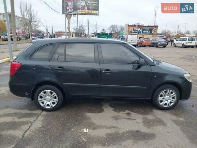 Черный Шкода Фабия, объемом двигателя 1.39 л и пробегом 346 тыс. км за 3500 $, фото 1 на Automoto.ua