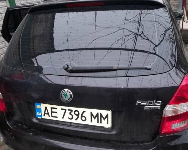 Черный Шкода Фабия, объемом двигателя 1.39 л и пробегом 170 тыс. км за 6900 $, фото 2 на Automoto.ua