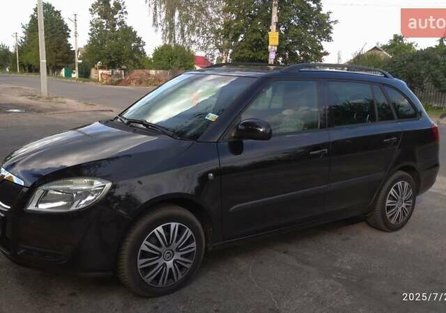 Черный Шкода Фабия, объемом двигателя 1.39 л и пробегом 204 тыс. км за 6200 $, фото 6 на Automoto.ua
