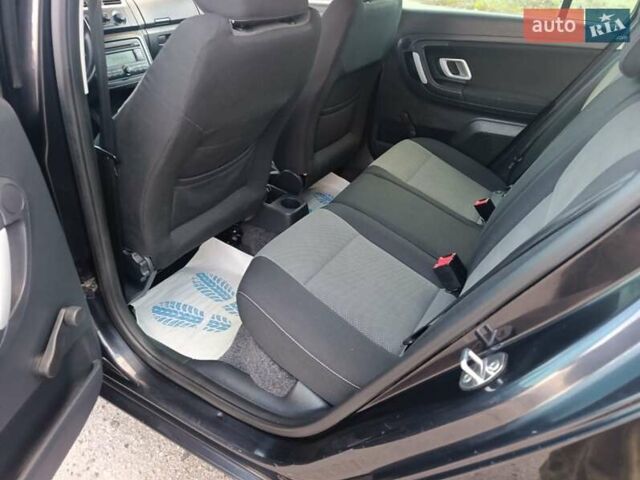 Черный Шкода Фабия, объемом двигателя 1.4 л и пробегом 219 тыс. км за 5999 $, фото 5 на Automoto.ua