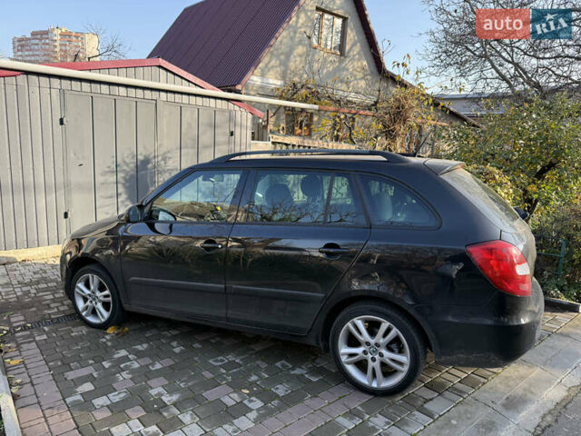 Черный Шкода Фабия, объемом двигателя 1.6 л и пробегом 200 тыс. км за 6900 $, фото 6 на Automoto.ua