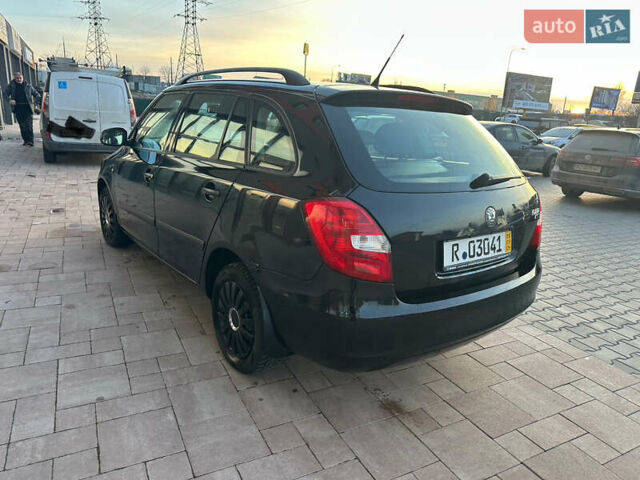 Черный Шкода Фабия, объемом двигателя 1.39 л и пробегом 222 тыс. км за 4750 $, фото 9 на Automoto.ua