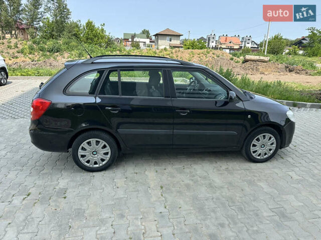 Черный Шкода Фабия, объемом двигателя 1.6 л и пробегом 230 тыс. км за 5999 $, фото 18 на Automoto.ua
