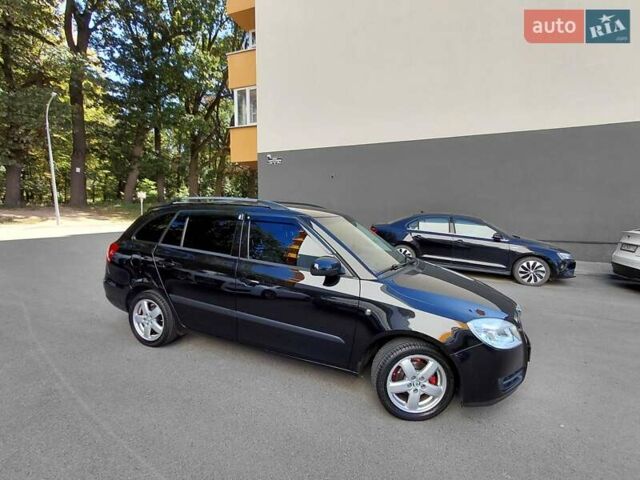 Черный Шкода Фабия, объемом двигателя 1.4 л и пробегом 233 тыс. км за 5300 $, фото 8 на Automoto.ua