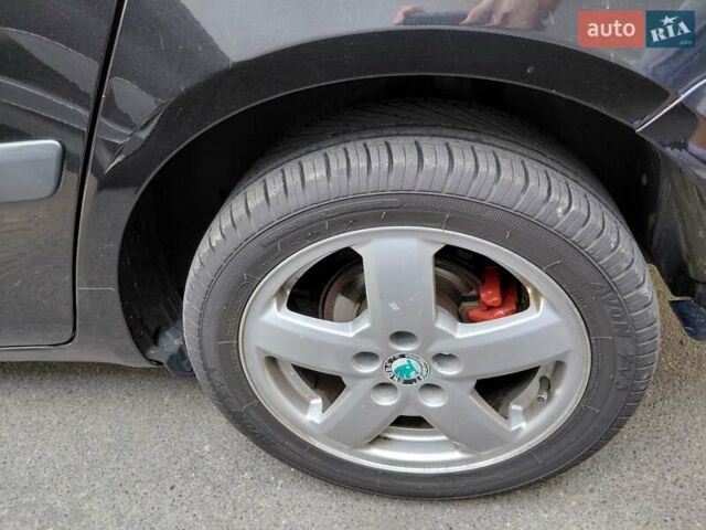 Черный Шкода Фабия, объемом двигателя 1.4 л и пробегом 233 тыс. км за 5300 $, фото 28 на Automoto.ua