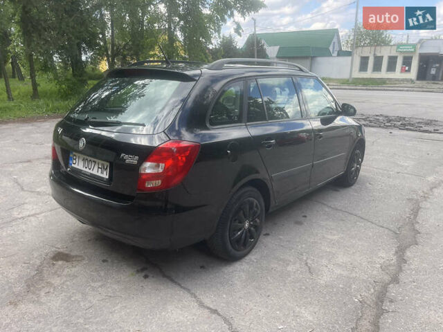 Черный Шкода Фабия, объемом двигателя 1.6 л и пробегом 230 тыс. км за 6200 $, фото 12 на Automoto.ua