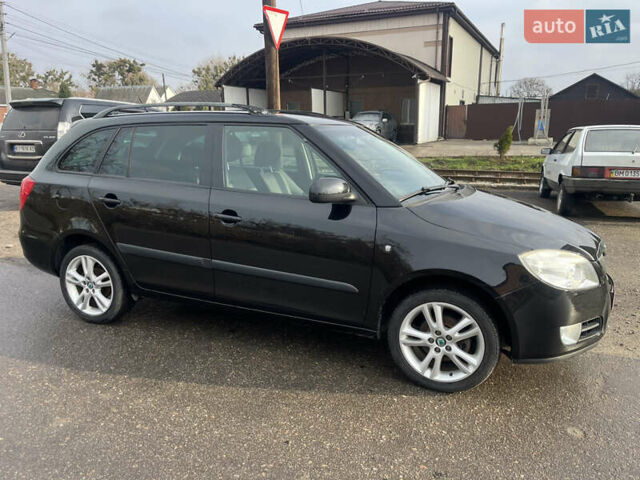 Черный Шкода Фабия, объемом двигателя 1.6 л и пробегом 169 тыс. км за 6350 $, фото 2 на Automoto.ua