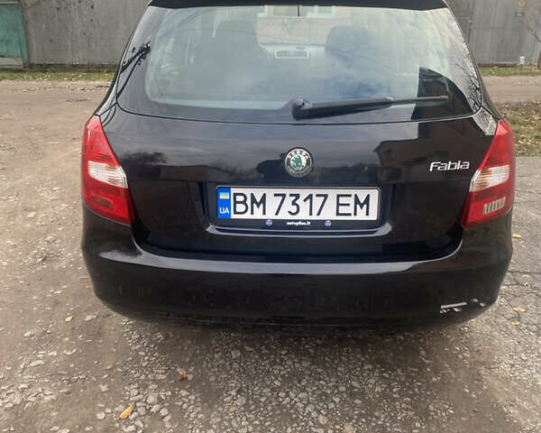 Черный Шкода Фабия, объемом двигателя 1.6 л и пробегом 172 тыс. км за 5950 $, фото 2 на Automoto.ua