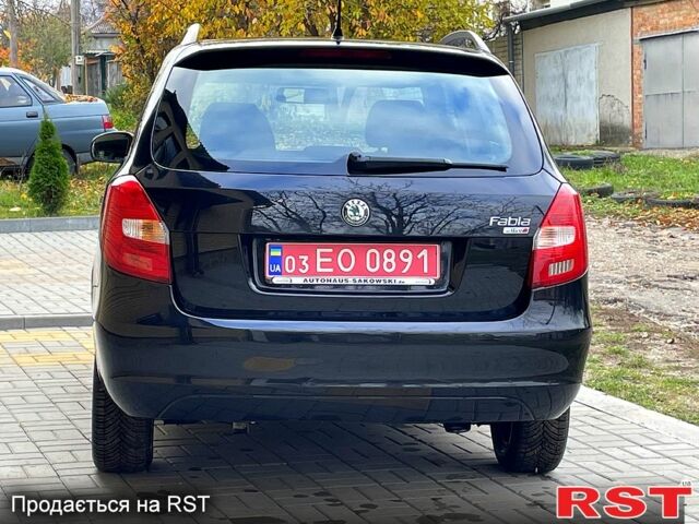 Черный Шкода Фабия, объемом двигателя 1.6 л и пробегом 185 тыс. км за 6100 $, фото 3 на Automoto.ua