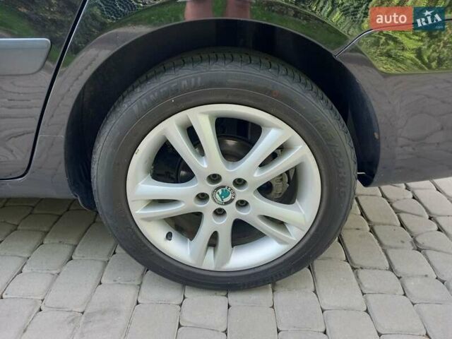 Черный Шкода Фабия, объемом двигателя 1.6 л и пробегом 210 тыс. км за 6500 $, фото 79 на Automoto.ua