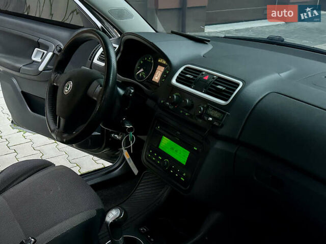 Черный Шкода Фабия, объемом двигателя 1.39 л и пробегом 243 тыс. км за 4350 $, фото 26 на Automoto.ua