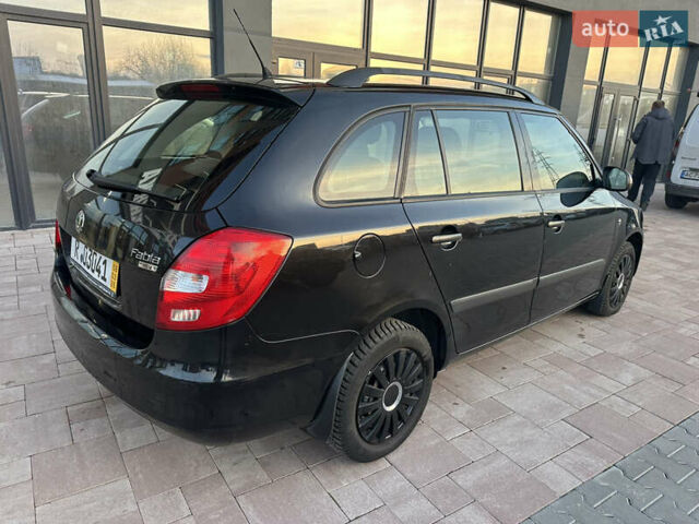 Черный Шкода Фабия, объемом двигателя 1.39 л и пробегом 222 тыс. км за 4750 $, фото 6 на Automoto.ua
