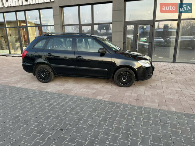 Черный Шкода Фабия, объемом двигателя 1.39 л и пробегом 222 тыс. км за 4750 $, фото 5 на Automoto.ua