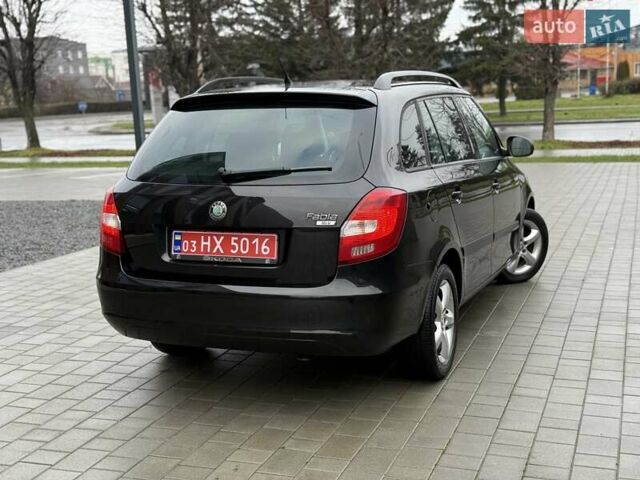 Черный Шкода Фабия, объемом двигателя 1.39 л и пробегом 195 тыс. км за 5250 $, фото 5 на Automoto.ua