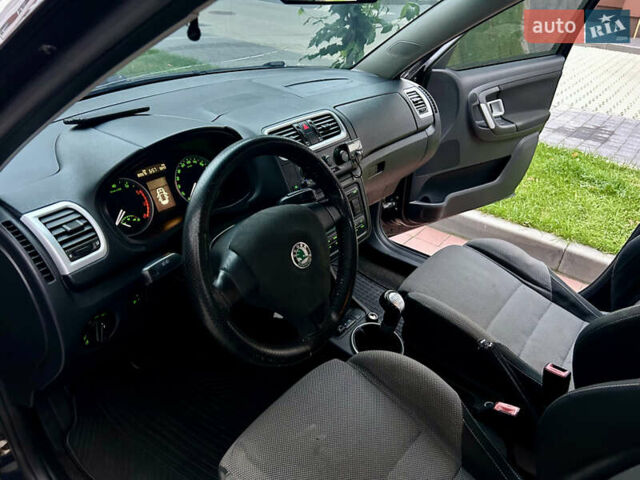 Черный Шкода Фабия, объемом двигателя 1.39 л и пробегом 243 тыс. км за 4350 $, фото 30 на Automoto.ua