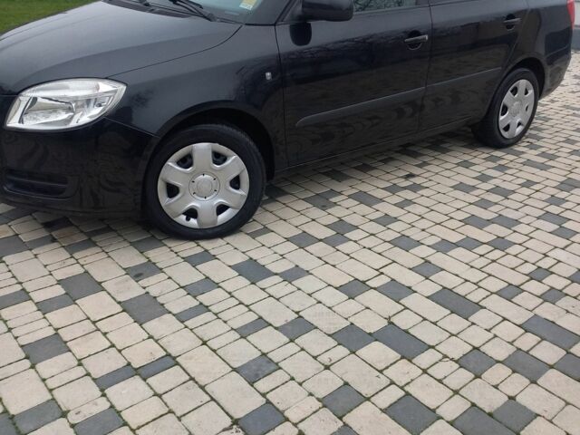 Черный Шкода Фабия, объемом двигателя 1.4 л и пробегом 212 тыс. км за 6300 $, фото 1 на Automoto.ua