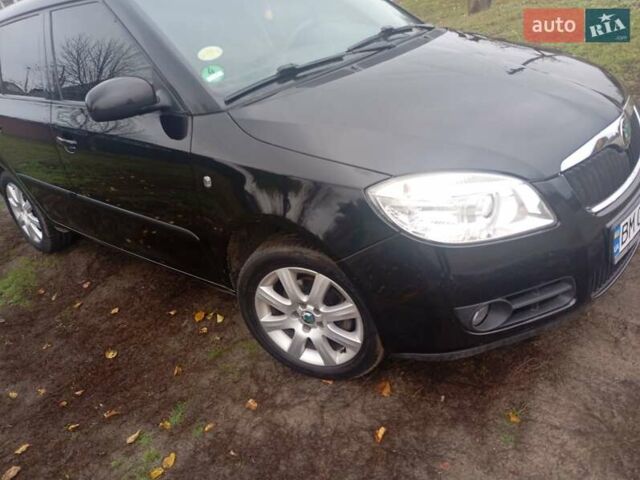 Черный Шкода Фабия, объемом двигателя 1.39 л и пробегом 186 тыс. км за 4750 $, фото 2 на Automoto.ua