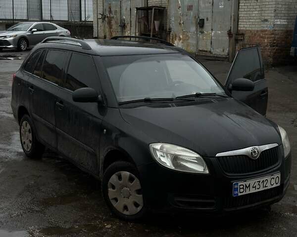 Черный Шкода Фабия, объемом двигателя 1.39 л и пробегом 214 тыс. км за 4700 $, фото 1 на Automoto.ua