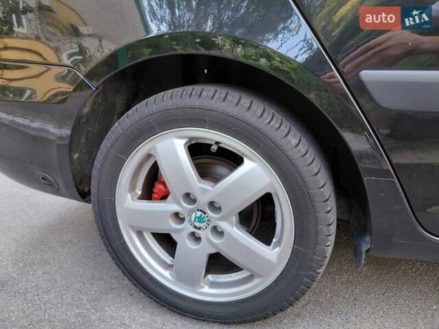 Черный Шкода Фабия, объемом двигателя 1.4 л и пробегом 233 тыс. км за 5300 $, фото 24 на Automoto.ua