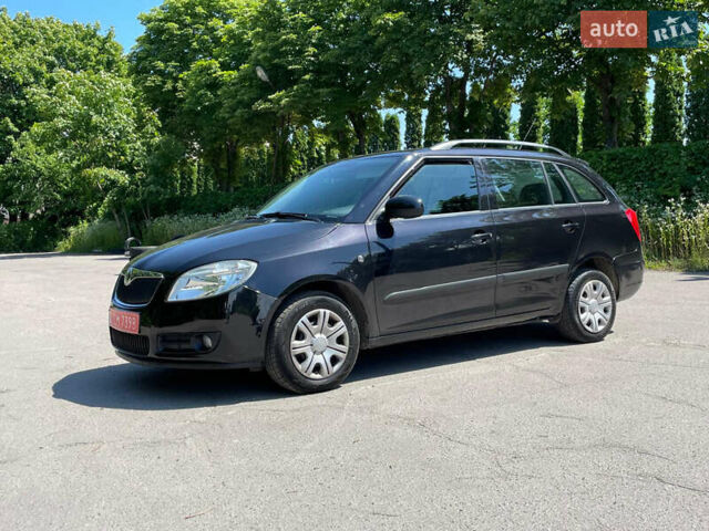 Черный Шкода Фабия, объемом двигателя 1.6 л и пробегом 230 тыс. км за 5499 $, фото 2 на Automoto.ua