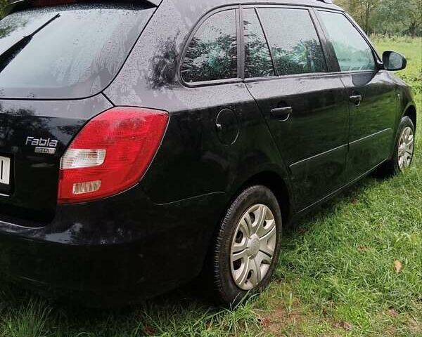 Черный Шкода Фабия, объемом двигателя 1.4 л и пробегом 234 тыс. км за 5050 $, фото 2 на Automoto.ua