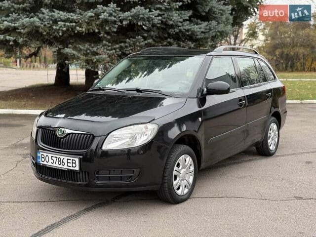 Черный Шкода Фабия, объемом двигателя 1.2 л и пробегом 225 тыс. км за 3250 $, фото 1 на Automoto.ua