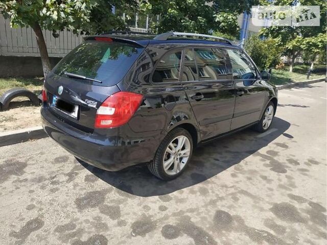 Черный Шкода Фабия, объемом двигателя 1.6 л и пробегом 171 тыс. км за 6900 $, фото 11 на Automoto.ua