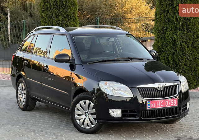 Черный Шкода Фабия, объемом двигателя 1.4 л и пробегом 195 тыс. км за 5850 $, фото 2 на Automoto.ua