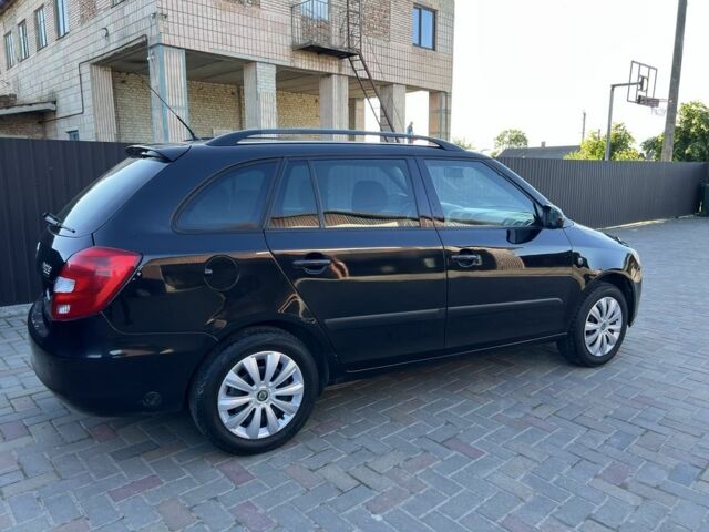Черный Шкода Фабия, объемом двигателя 1.4 л и пробегом 226 тыс. км за 5100 $, фото 5 на Automoto.ua